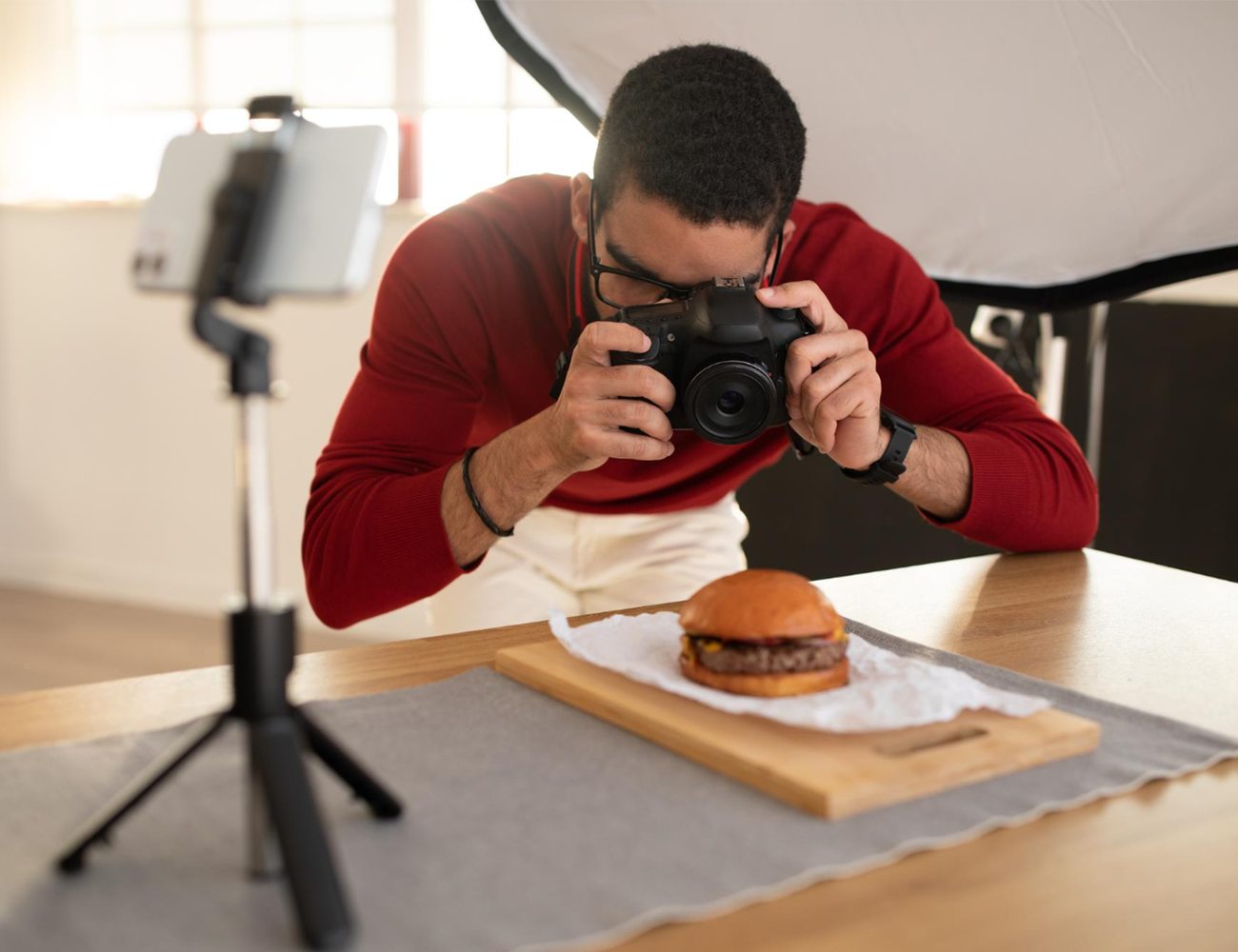 small business owner taking photos of product for social media marketing